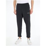 Calvin Klein Jeans Spodnji deli trenirke Wo Woven Črna Cene