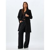 Koton Long Double Breasted Cashmere Coat with Reverse Collar and Buttoned Pockets | Shoptok.si