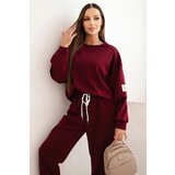 Kesi Włoski Ladies' butter set with a loose sweatshirt and pants with the inscription LOVE khaki Cijene