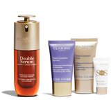 Clarins Double Serum & Nutri-Lumière Collection set: serum za obraz Double Serum 50 ml + dnevna krema za obraz Nutri-Lumiere Revive 15 ml + nočna krema za obraz Nutri-Lumiere Nuit 15 ml + podlaga za ličila SOS Primer 5 ml + rdeča kozmetična torbica za ženske | Shoptok.si