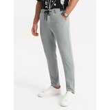 Ombre Men's knitted pants with elastic waistband - light grey Cene
