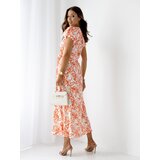 Resti Patterned Women's midi dress with short sleeves, a wrap neckline, and a belt Cijene