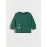 Reserved oversize top z dolgimi rokavi z božičnim motivom - zelena Cene