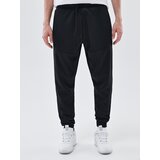 Cropp - Hlače jogger - Črna Cene