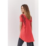 Fasardi Asymmetrical coral tunic with wings on the back cene