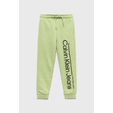 Calvin Klein Jeans Otroške trenirka hlače zelena barva | Shoptok.si