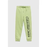 Calvin Klein Jeans Otroške trenirka hlače zelena barva