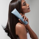 Aveda Smooth Infusion™ Perfectly Sleek™ Heat Styling Cream termo zaščitna krema za gladitev neobvladljivih las proti krepastim lasem 150 ml | Shoptok.si