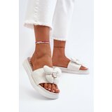 Kesi White Cedrella women's slippers with low platform embellishment Cene
