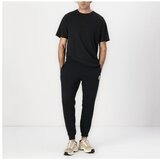 Converse STANDARD FIT CHUCK TAYLOR PATCH PANTS UNISEX Crna | shoptok.hr