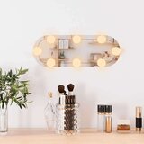 vidaXL Stensko ogledalo z LED lučmi 15x40 cm stekleno ovalno | Shoptok.si