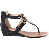 Shelvt Black low wedge sandals with gold trim Cene