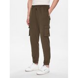 Ellesse Spodnji del trenirke Penfold SHR17788 Zelena Regular Fit | Shoptok.si