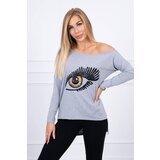 Kesi Printed blouse with a longer back in grey Cene