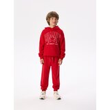 Reserved Pamučne jogger hlače - crvena Cijene