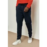 AC&Co / Altınyıldız Classics Men's Navy Blue Standard Fit Normal Cut, Elastic Waist And Legs. Comfortable Sports Sweatpants.
