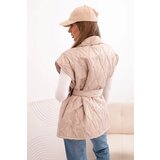 Kesi Włoski Women's quilted vest with a belt and a wide collar beige | shoptok.hr