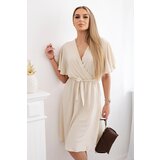 Kesi Włoski Women's dress with a plunging neckline - beige Cijene