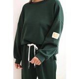 Kesi Włoski Women's set with a loose sweatshirt and pants with the word LOVE dark green | ePonuda.com