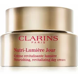 Clarins Nutri-Lumière Day revitalizirajuća dnevna krema za sjajni izgled lica 50 ml