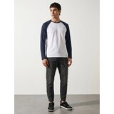 Sinsay Pamučna majica s dugim raglan rukavima | shoptok.hr