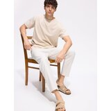 Reserved Pamučne jogger hlače - krem | shoptok.hr
