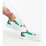 Gemre White sneakers with green accent Fournie | Shoptok.si
