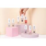 Notino Nail Care Strengthening Vitamin Base Coat negovalni lak za nohte z vitamini A, C, E 10 ml | Shoptok.si