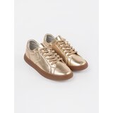 Sergio Leone s gold leather sneakers | ePonuda.com