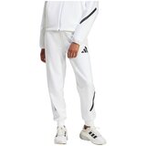 Adidas Spodnji deli trenirke Pantalons de survêtement Z.N.E. confort et style Bela Cene
