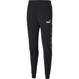 Puma Spodnji deli trenirke ESS+ TAPE SWEATPANT Črna | Shoptok.si