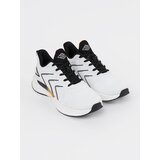 VICO Black and white sneakers with orange element | Shoptok.si