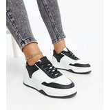 Gemre White and black sneakers on a thicker sole Rumai | Shoptok.si