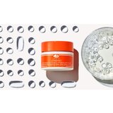 Origins GinZing™ Eye Cream To Brighten And Depuff posvetlitvena krema za predel okoli oči proti zabuhlosti in temnim kolobarjem odtenek Warm 15 ml | Shoptok.si