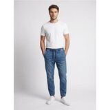 Sinsay Slim jogger traperice s efektom pranja Slike