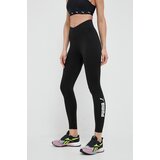 Puma Pajkice za vadbo Favorite Logo črna barva | Shoptok.si