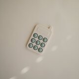 Mushie Pop-It Phone aktivnostna igrača za otroke Cambridge Blue 10m+ 1 kos | Shoptok.si