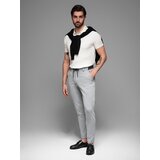 Ombre Men's knitted pants with elastic waistband - light grey Cene