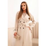Kesi Włoski Women's eco-leather trench coat with a classic collar and a tied belt beige | ePonuda.com