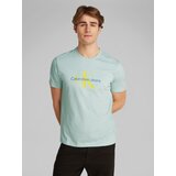 Calvin Klein Jeans Majica 'HERO' modra / temno rumena / meta | Shoptok.si