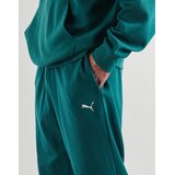 Puma Spodnji deli trenirke ESS ELEVATED Sweatpants TR cl Zelena Cene