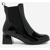 Resti Black women's boots on a low post Nekery | Shoptok.si