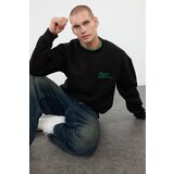 Trendyol Black Oversize/Wide Cut Embroidered Sweatshirt with Fleece Inside Cene