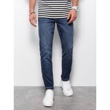 Ombre Spodnie męskie jeansowez przetarciami REGULAR FIT - ciemnoniebieskie | shoptok.hr