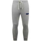 Enos Spodnji deli trenirke 151198215 Siva | Shoptok.si