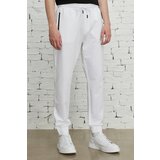 ALTINYILDIZ CLASSICS Men's White Standard Fit Regular Cut Sweatpants. Cene