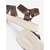 Sergio Leone Brown sandals on a white platform | Shoptok.si