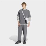 Adidas Spodnji deli trenirke KS5566 Siva Cene