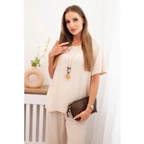 Kesi Włoski Women's set with a loose blouse and wide pants beige Cijene