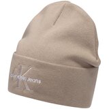 Calvin Klein Jeans Kape MONO LOGO EMBRO BEANIE K60K612668 Bež | Shoptok.si